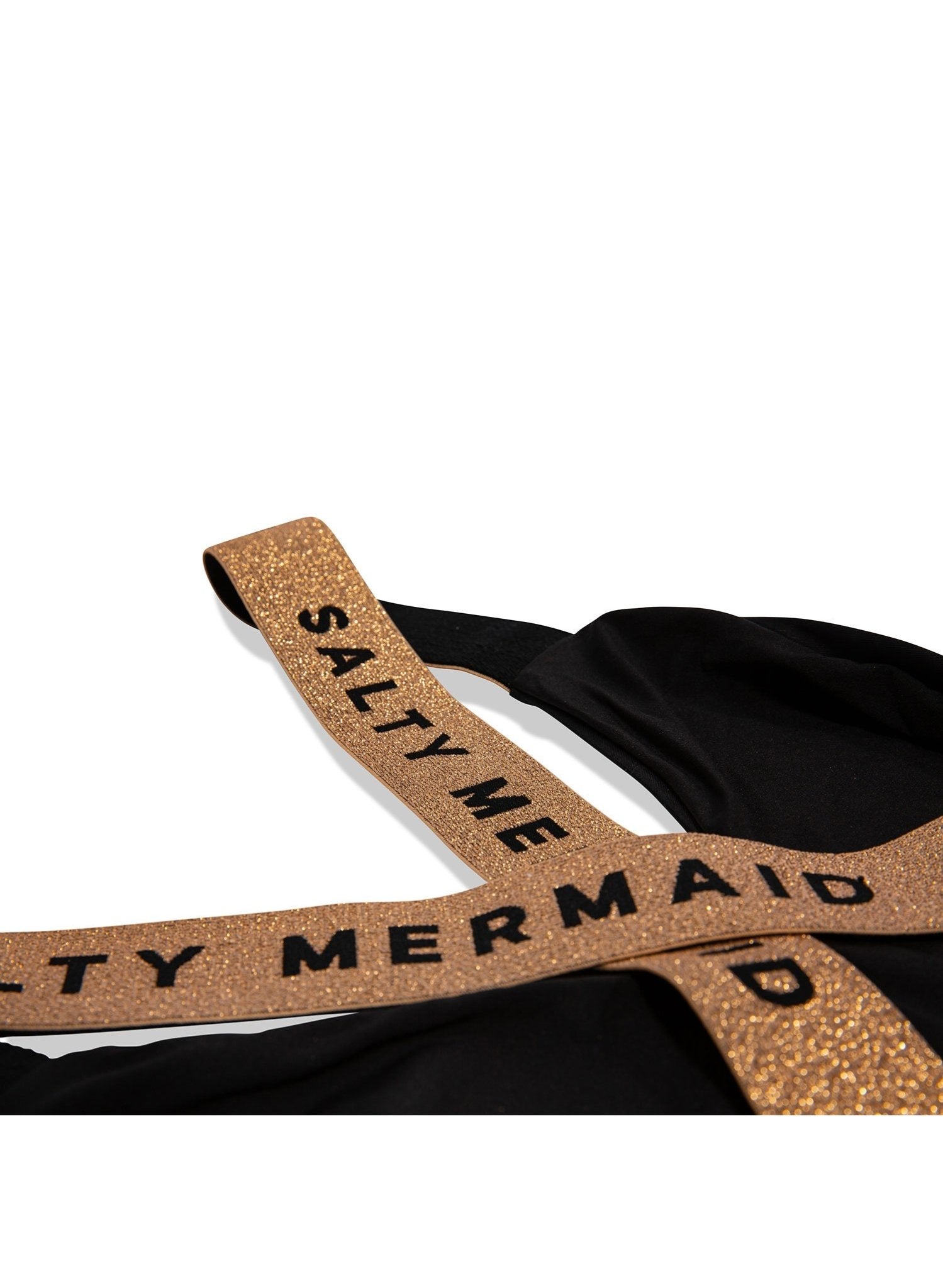 close up of salty mermaid gold shimmer banded straps salty banded black swimsuit