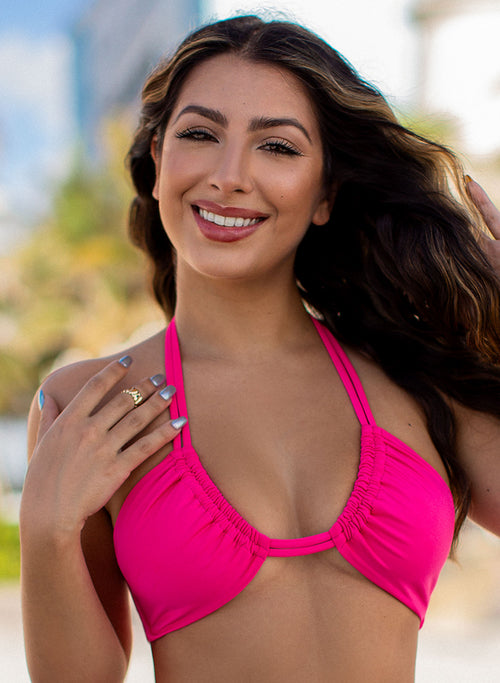 Salty Mermaid Flamingo Fizz Pink Ursula Halter Bikini Top featuring perfectly fitting cups, supportive side boning, and hand-beaded tie-ends. Bold and feminine halter swim top designed for style, comfort, and standout resortwear appeal.
