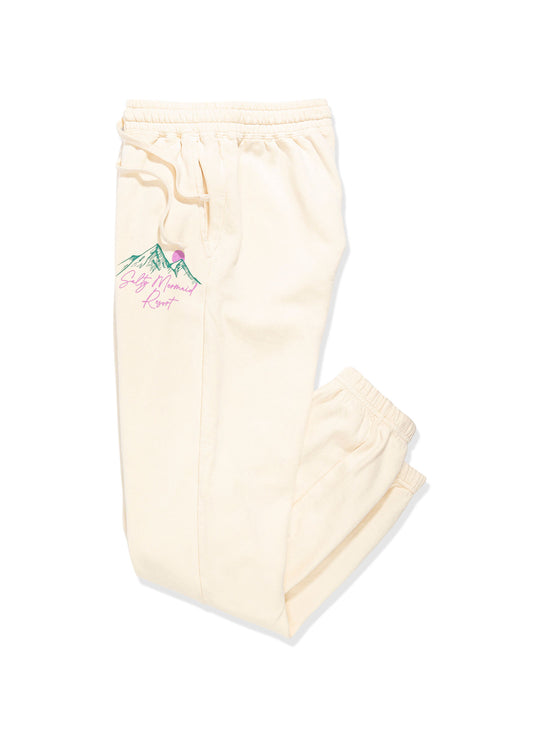Salty mermaid cream women's joggers with Aspen Resort vintage ski graphic.