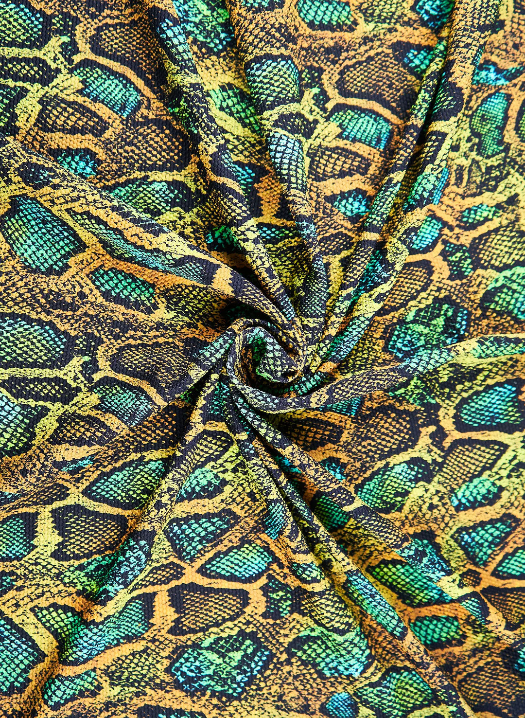 snake charmer swim fabric swatch- Textured piqué snake print swim fabric in green and gold tones, Salty Mermaid swimwear close-up