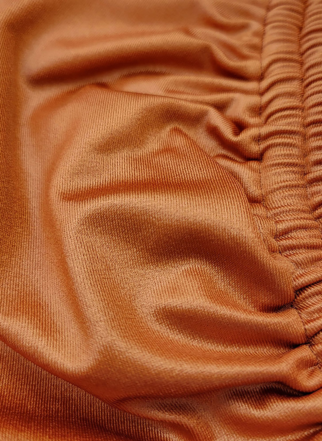 Pearl Cabana Club Swim Ursula Bikini Set with tie-side bottoms and halter top

Orange metallic bikini with ruched halter cut and cheeky bottoms

Ursula Bikini Set in shimmer orange with scoop halter and side ties

Triangle-style Ursula Bikini with tie-sides and metallic finish

Metallic orange Ursula Bikini featuring cheeky cut and ruched top