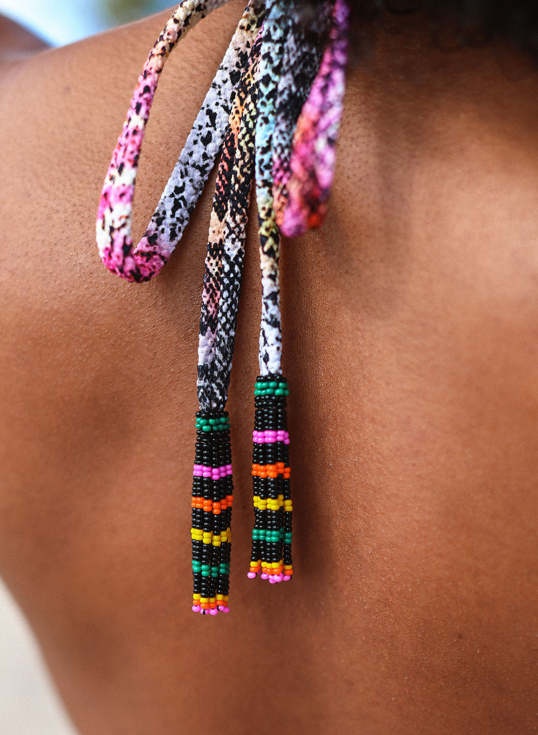Hand-beaded ties + rainbow snakeskin detail on luxe triangle bikini top salty mermaid saltwater serpent print collection