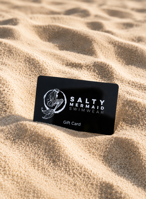 Salty Mermaid Swimwear gift card on sand