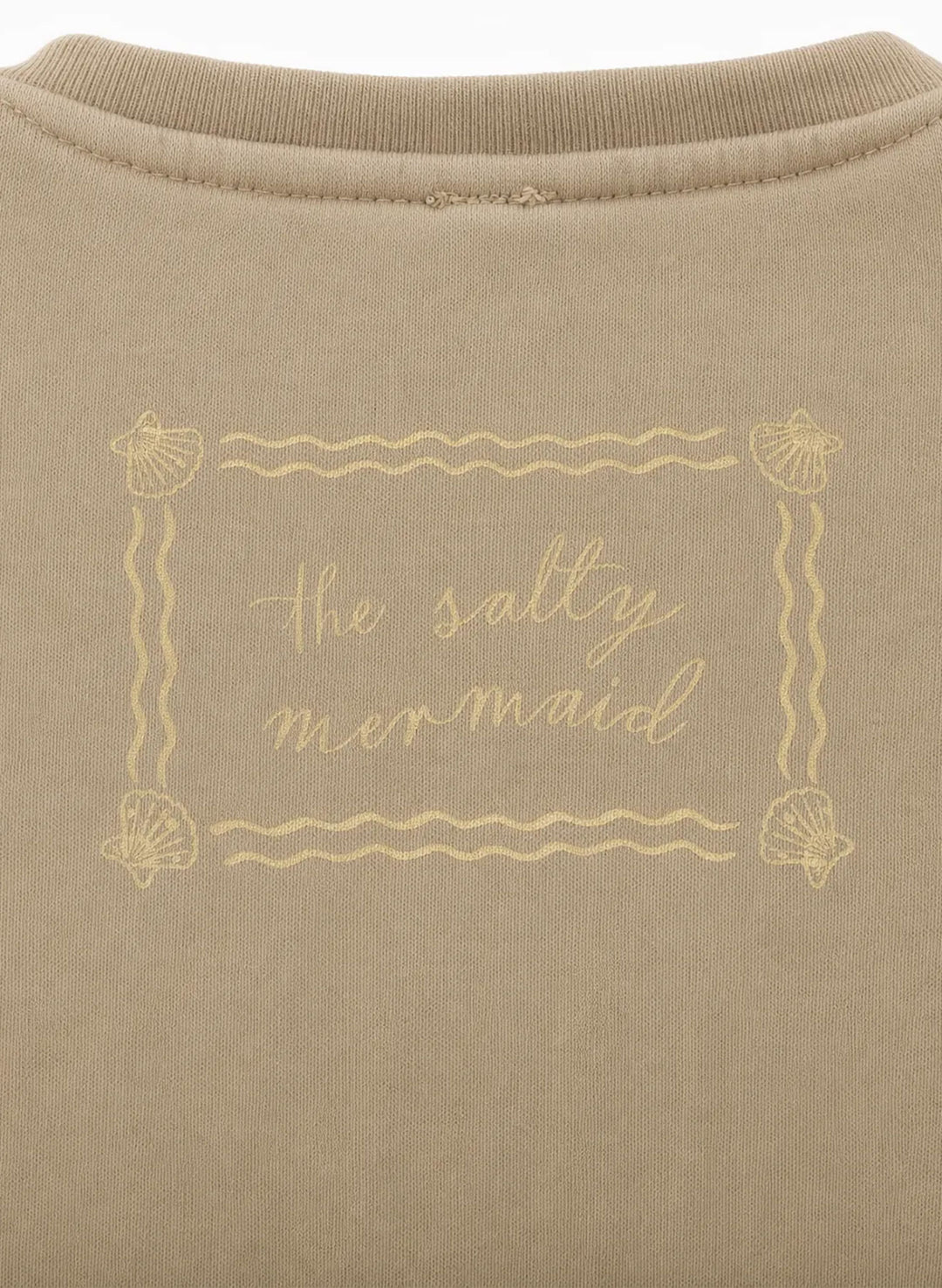 Close-up Salty Mermaid sand crewneck sweatshirt label graphic, shell border print, soft fleece texture