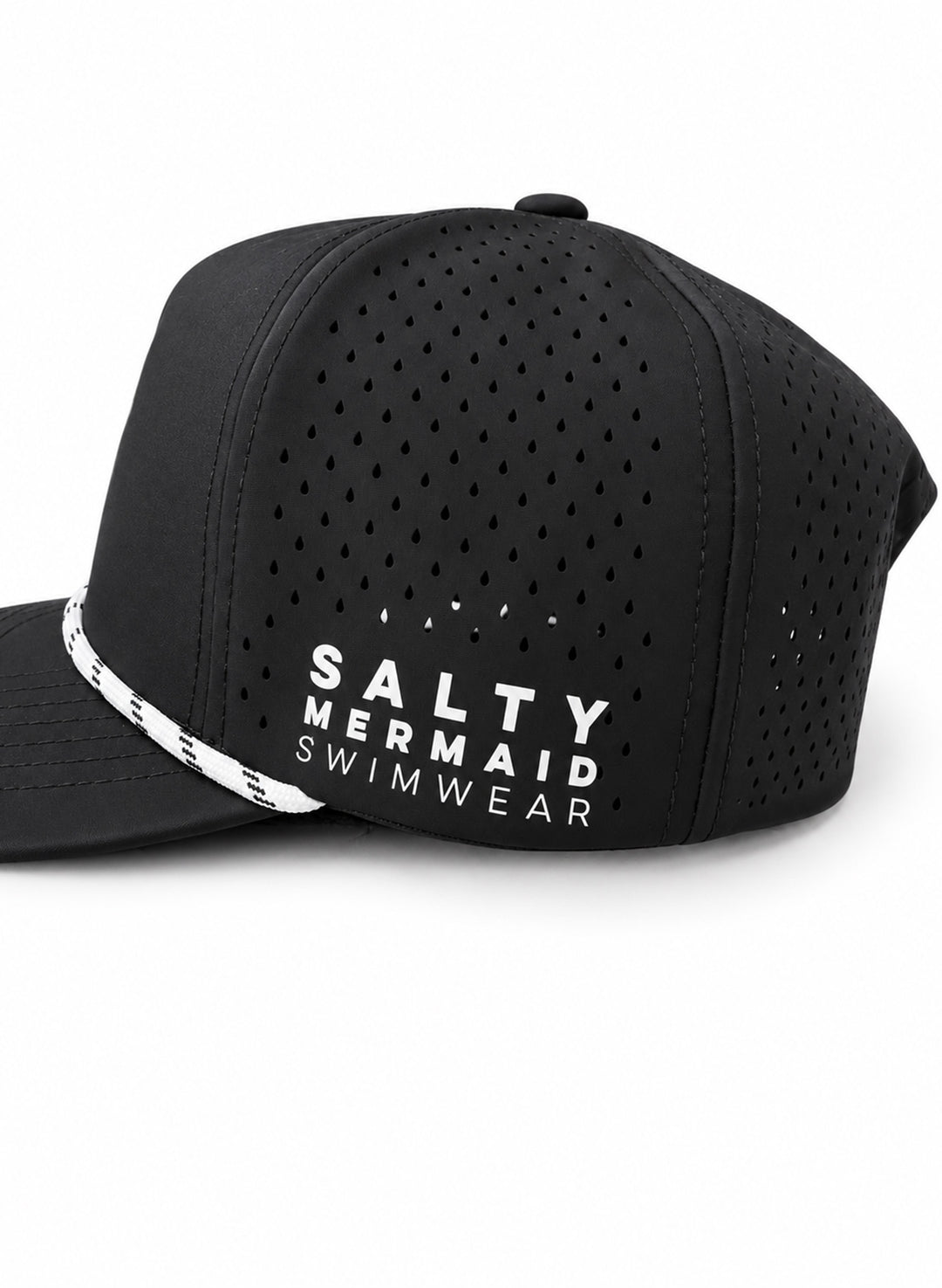 Close-up of Salty Mermaid black golf hat with teardrop ventilation holes, white SALTY MERMAID SWIMWEAR lettering, and rope trim.
