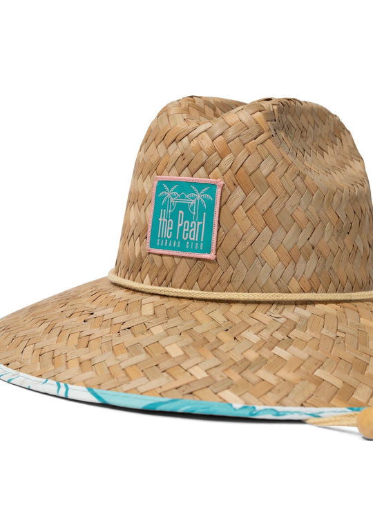 Wide brim straw beach hat with Pearl Cabana Club patch, woven straw texture, and turquoise wave print edge by Salty Mermaid
