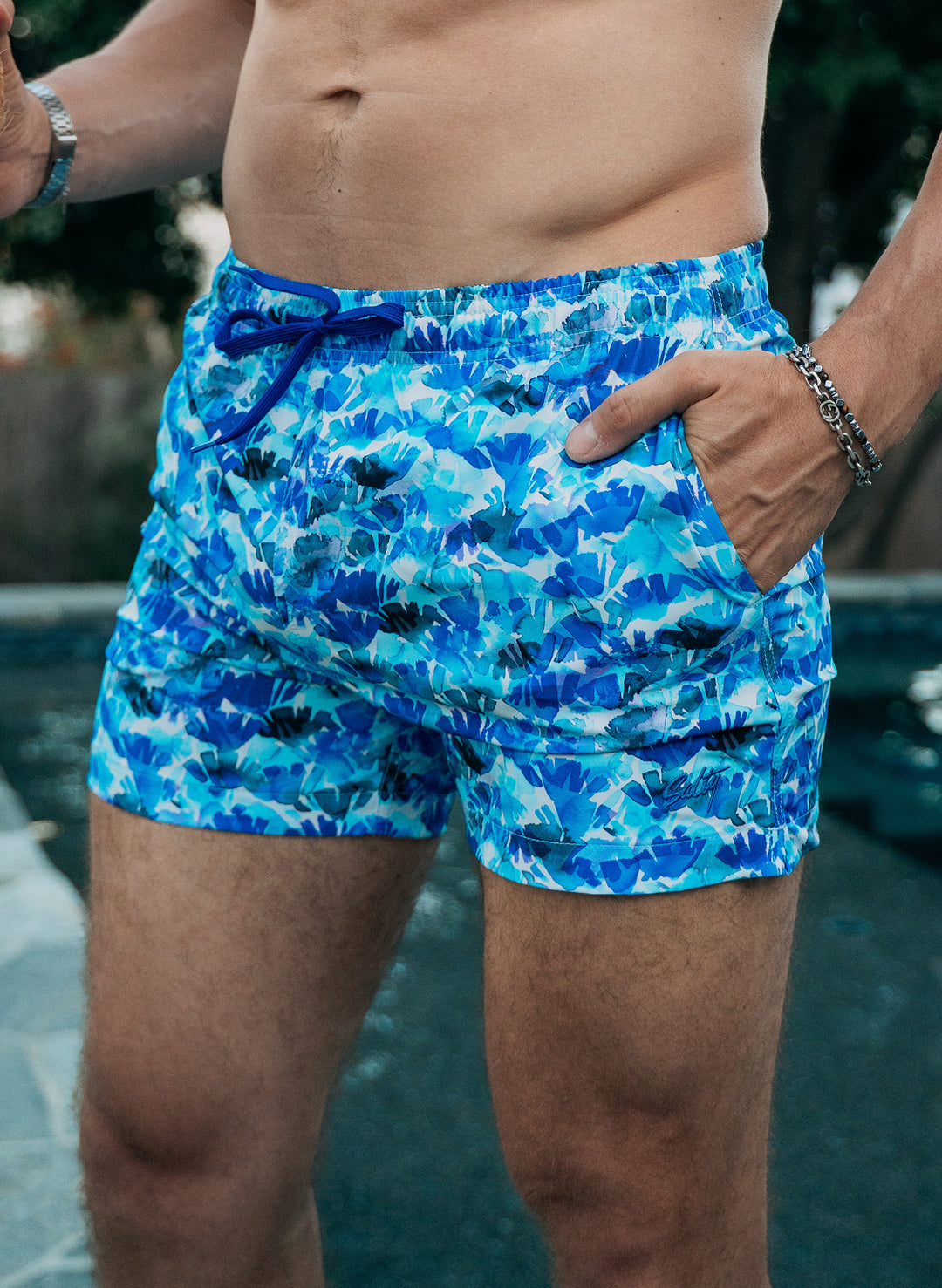 men's 4" inseam swim trunks for men's trending fit patterned swim trunks in blue and white by salty mermaid.