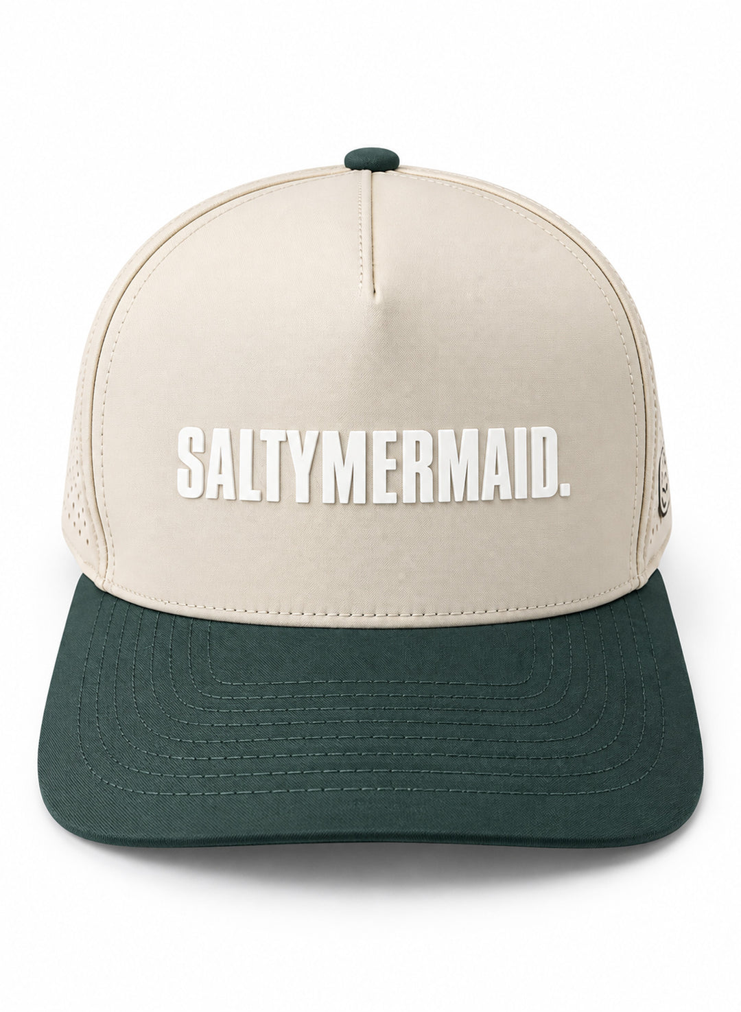 Front view of Salty Mermaid two-tone performance hat with a cream crown, raised white rubber lettering and forest green brim.
