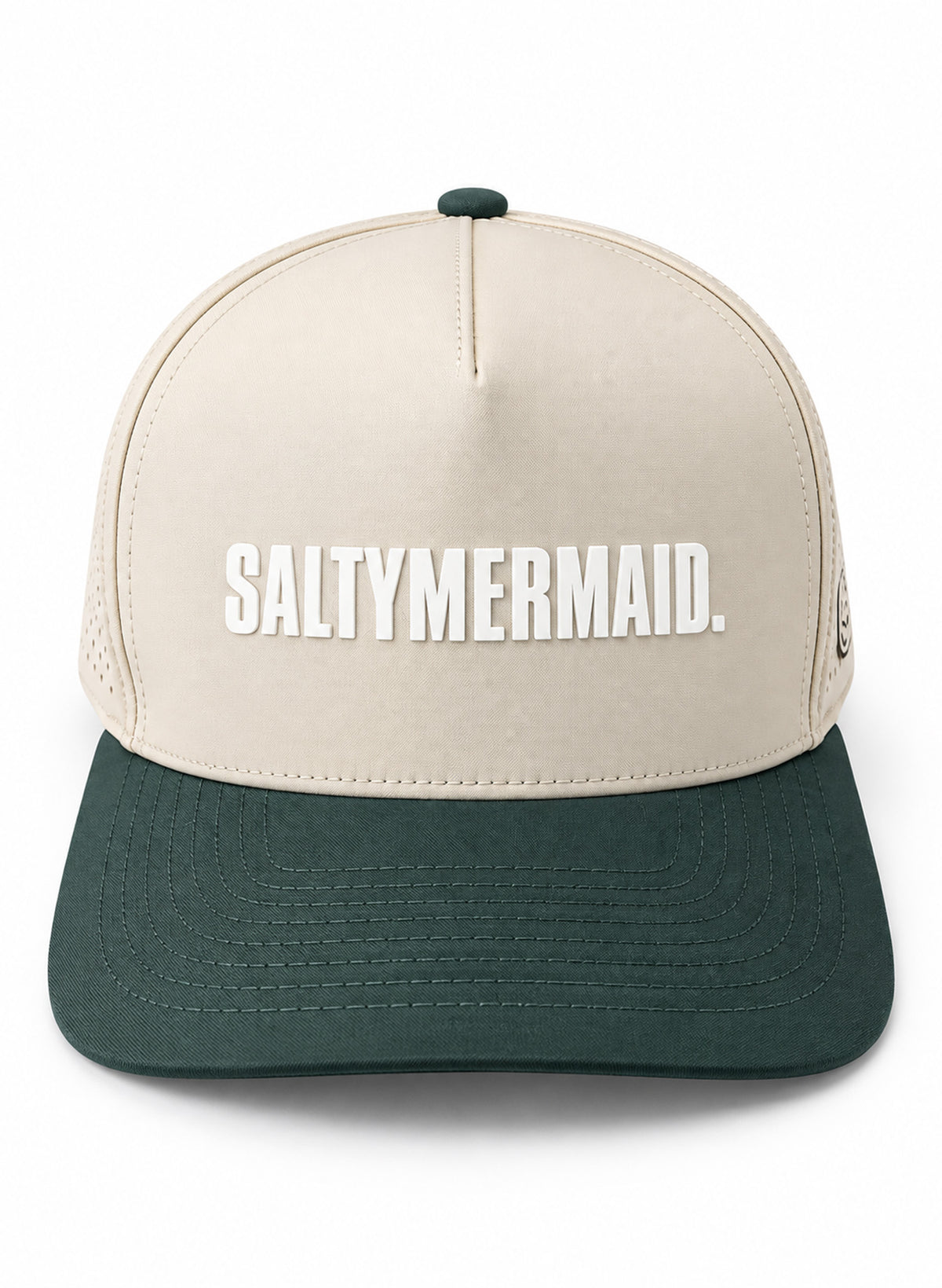 Front view of Salty Mermaid two-tone performance hat with a cream crown, raised white rubber lettering and forest green brim.
