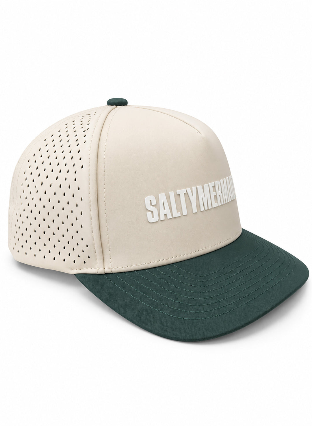 Side angle of Salty Mermaid cream and forest green performance hat with raised white front lettering and perforated side panels.

