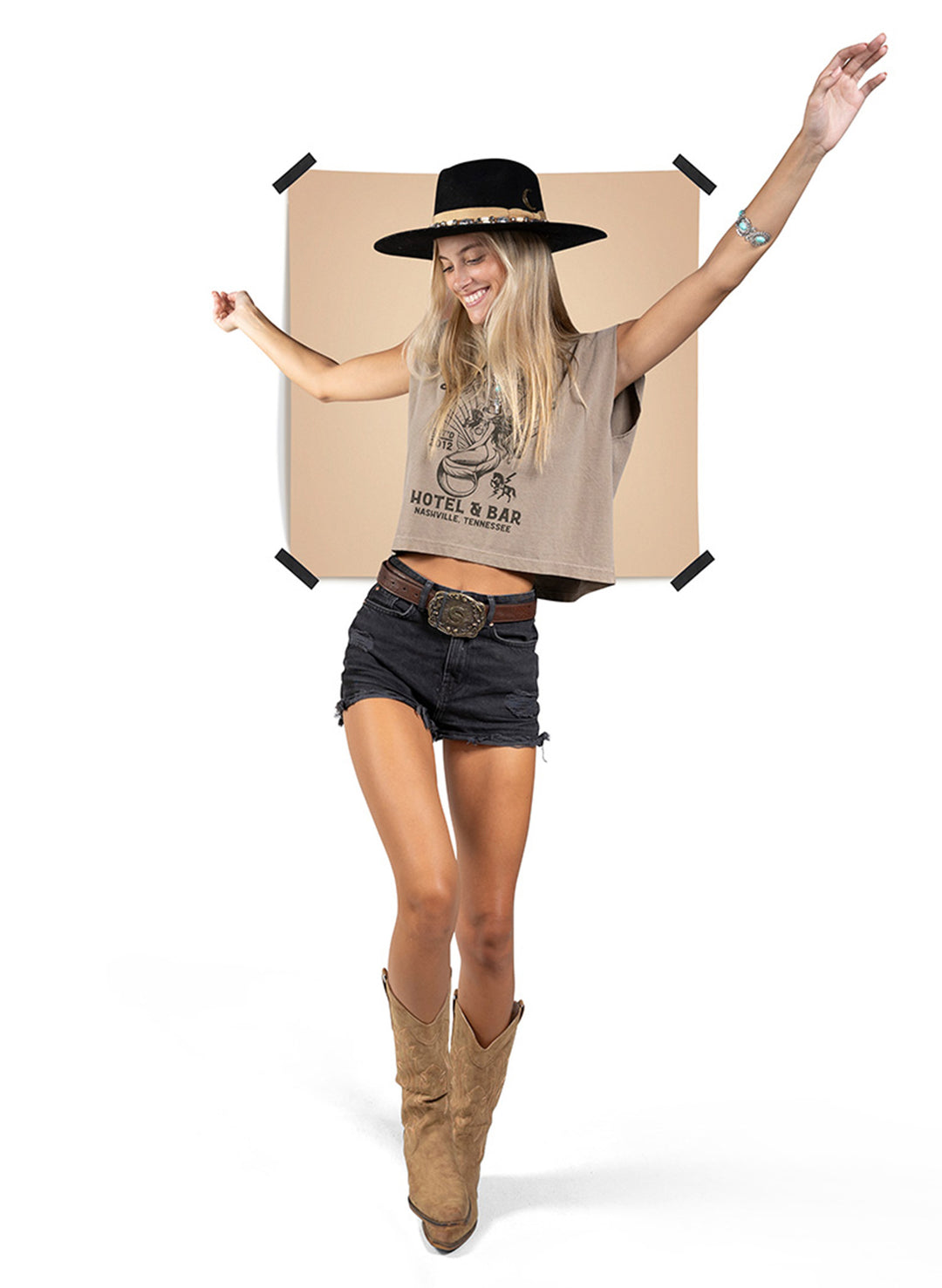 Nashville cropped sleeveless t-shirt with western-style mermaid in seashell graphic on a white backdrop made by Salty Mermaid.